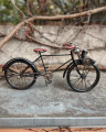 Металлическая модель черного велосипеда из листового металла