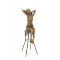Статуя  девушки на барном стуле из бронзы