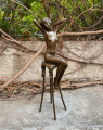 Статуэтка из бронзы Обнаженная женщина на стуле